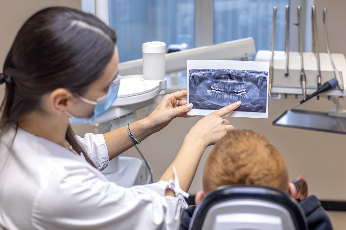 Dentist Showing X-ray
