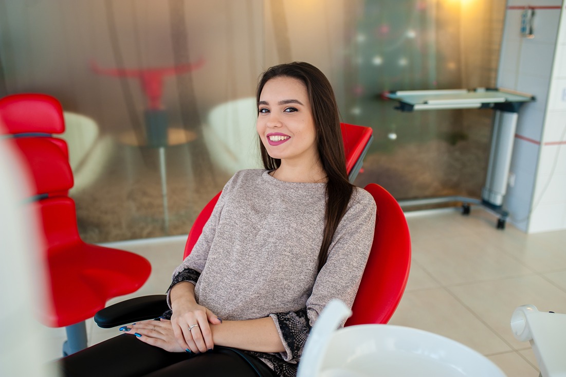 Smiling Girl in Dental Clinic